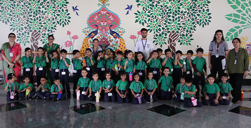 Students and teachers posing for annual group photograph in campus